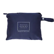 Weathergoods Sweden poncho Imbris, waterdicht en 100% gerecycled, zichtbaar in een heldere, waterdichte stof met capuchon.