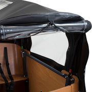 Babboe bakfietsshoes met zwarte PVC regenbestendige set voor bescherming tegen regen, passend bij Babboe Regentent Go.