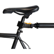 Zwarte Burley Travoy transportfietskar, inklapbaar, geschikt voor het vervoeren van spullen op de fiets.