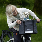 Grijze KLICKfix Doggy Shopper hondenfietsmand met 24 liter capaciteit, geschikt voor vervoer van honden op de fiets