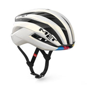 MET Trenta 3K Carbon MIPS racefietshelm met kleurrijke rainbow-uitvoering en ventilatieopeningen, ontworpen voor wielrenners.