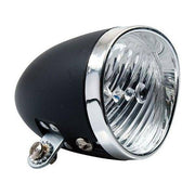 Simson koplamp Classic batterij in doos, geschikt voor oude modellen, zwart met koplampglas en bevestigingsbeugel.