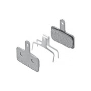 Shimano Deore M05 resin remblokset voor schijfremmen, zichtbaar met zwarte remblokken en bevestigingsonderdelen.