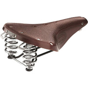 Brooks Fietszadel B67 voor heren op stadsfiets of E-bike, comfortabel en klassiek ontworpen zadel, zichtbaar vanaf de zijkant.
